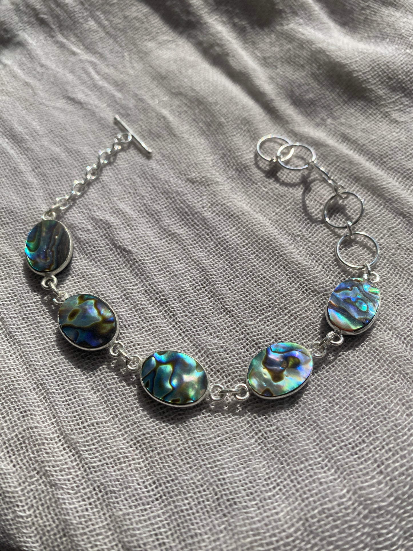 Shimmering 5-Stone Abalone Shell Bracelet