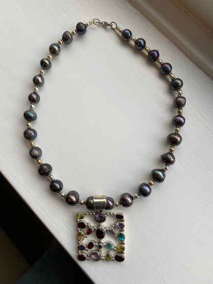 Stone Studded Silver Pendant on Tahitian Black Pearl