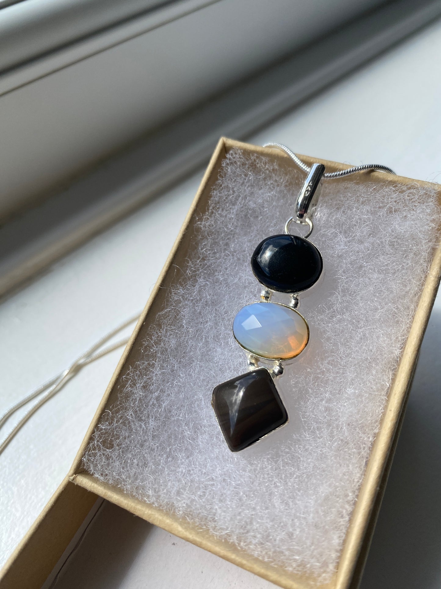 Black Onyx, Moonstone and Smoky Quartz Pendant
