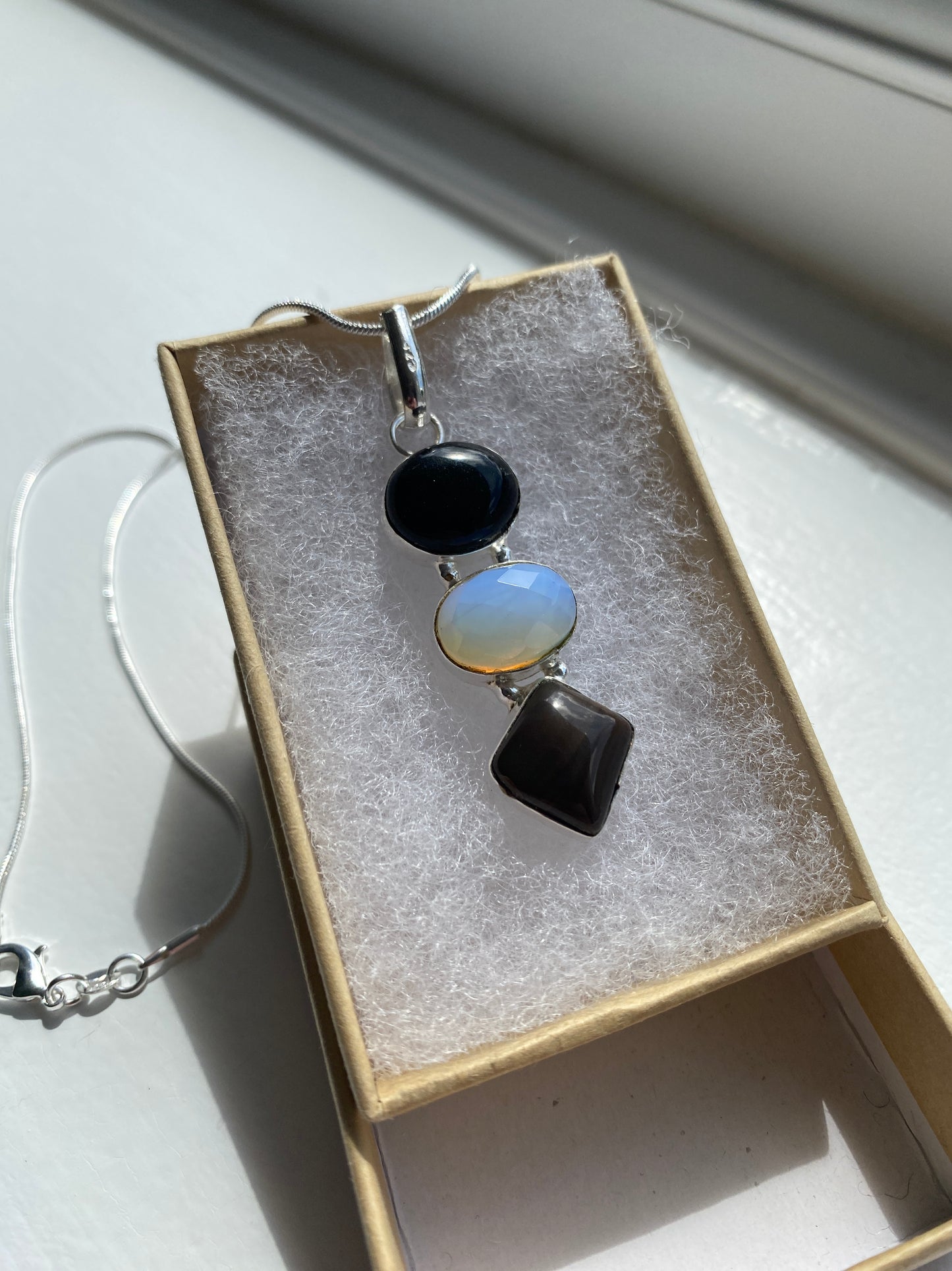 Black Onyx, Moonstone and Smoky Quartz Pendant