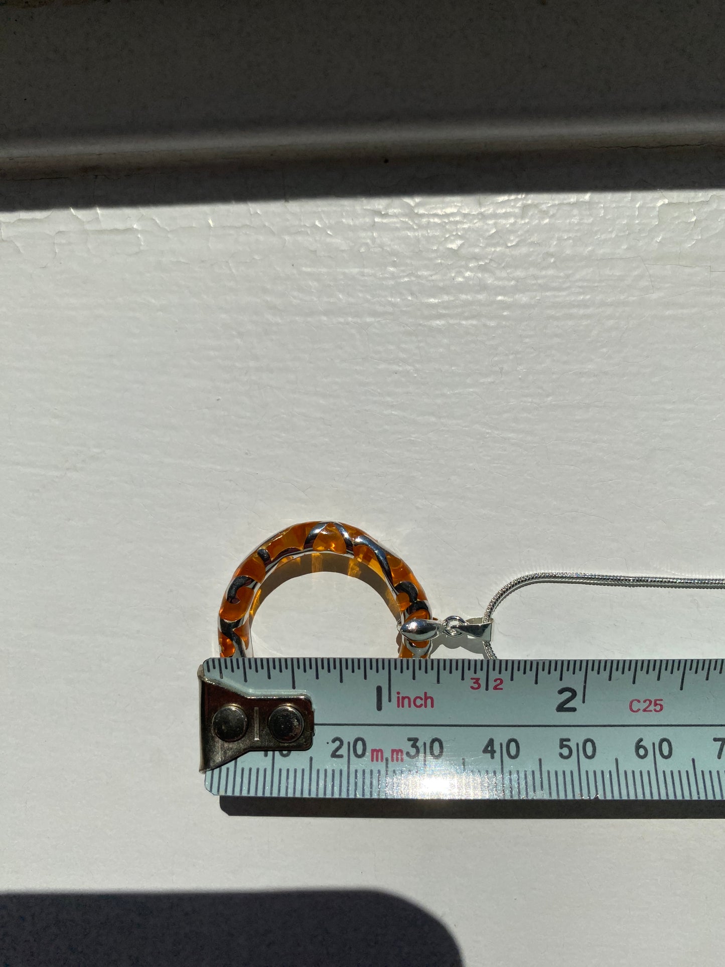 Circular Orange & Silver Pendant
