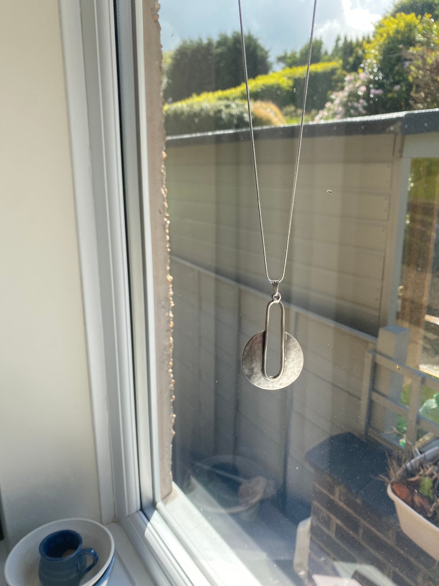 Uniquely Shaped Silver Tone Pendant Necklace
