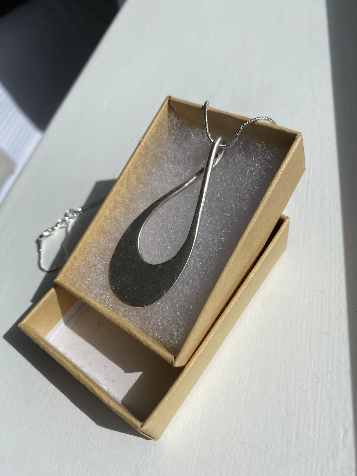 Silver Curve Pendant Necklace