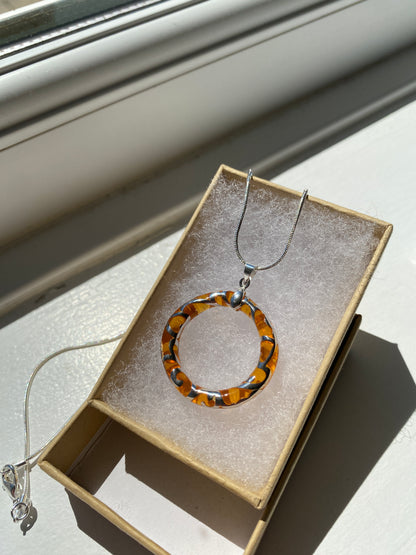 Circular Orange & Silver Pendant