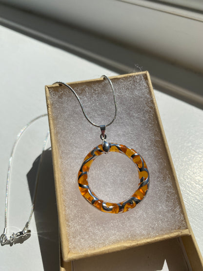 Circular Orange & Silver Pendant