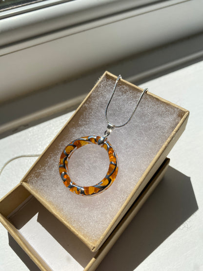 Circular Orange & Silver Pendant