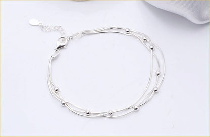 Three-Layer Beaded Silver Bracelet