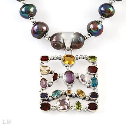Stone Studded Silver Pendant on Tahitian Black Pearl