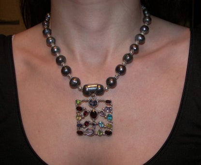 Stone Studded Silver Pendant on Tahitian Black Pearl
